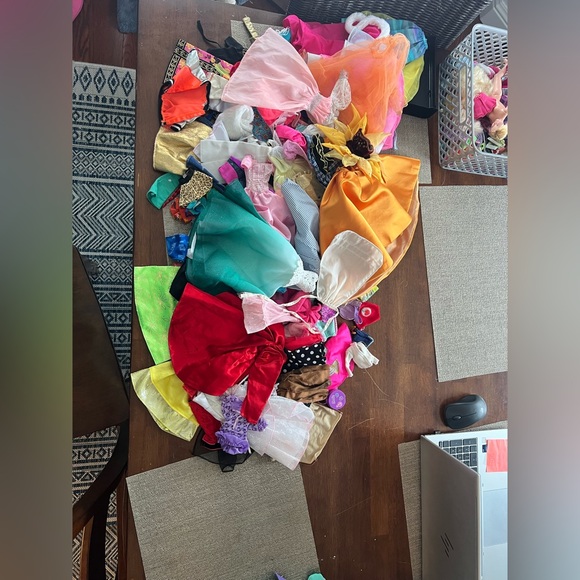 Huge lot of Barbie clothing